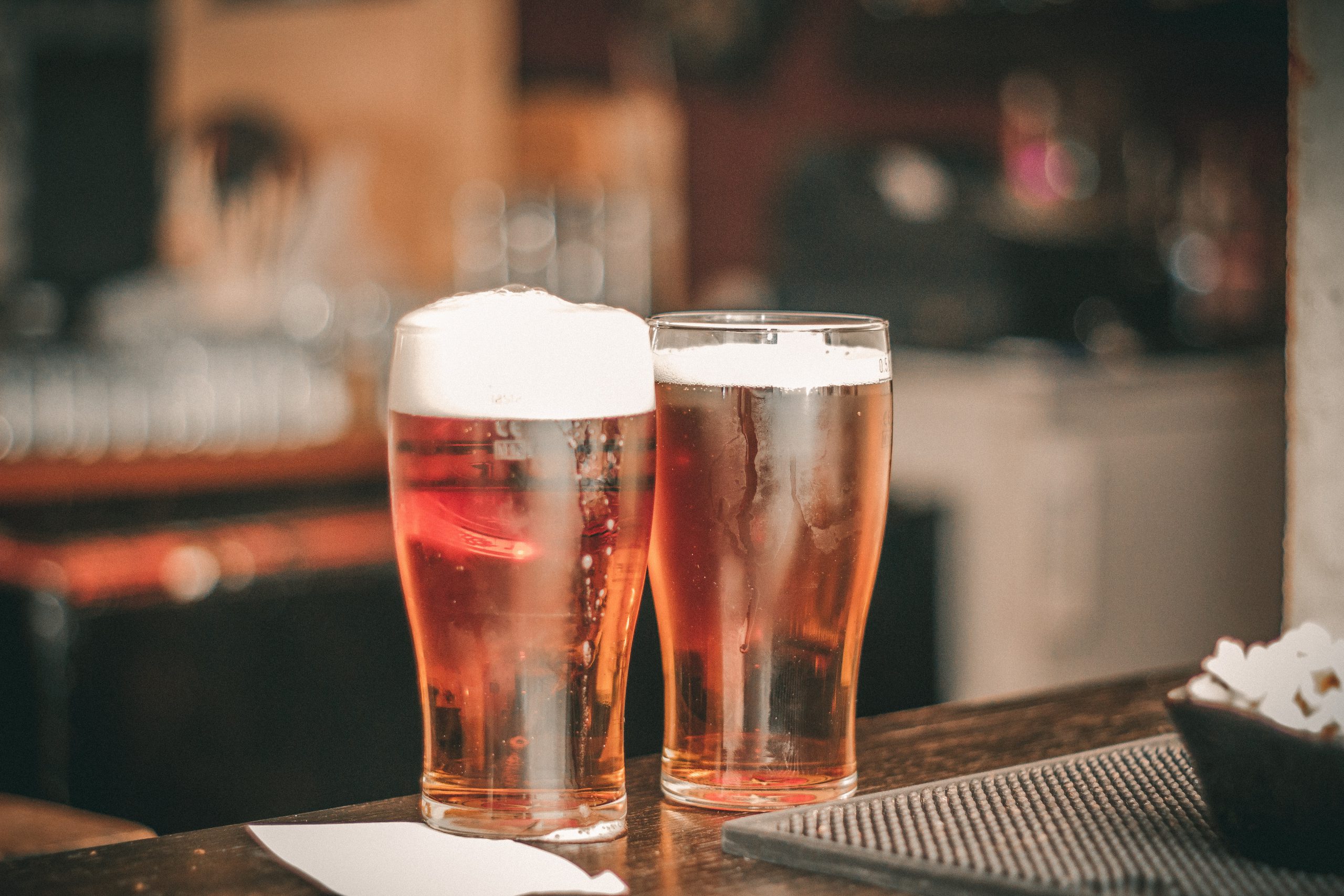 depth-of-field-photo-of-two-pilsner-glasses-681847