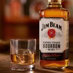 "Jim Beam Bourbon bottle with a glass of whisky">