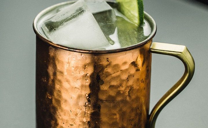"moscow mule topped with ice and lime">