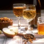 "Medovukha drinks with apple and dryfruits">