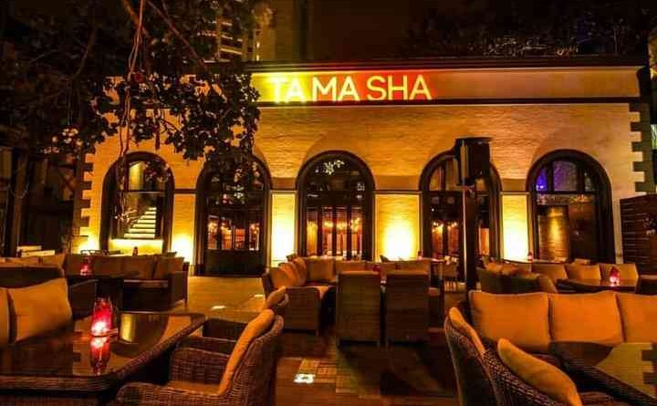 "tamasha bar with outdoor seating area.">