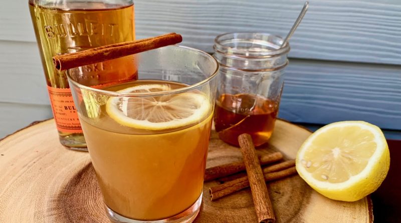 "Toddy drink with lemon and glasses to enjoy">