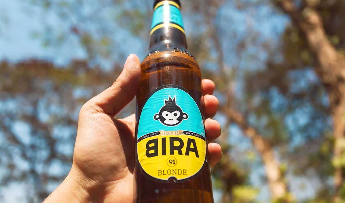 "Bira 91 blonde beer.">